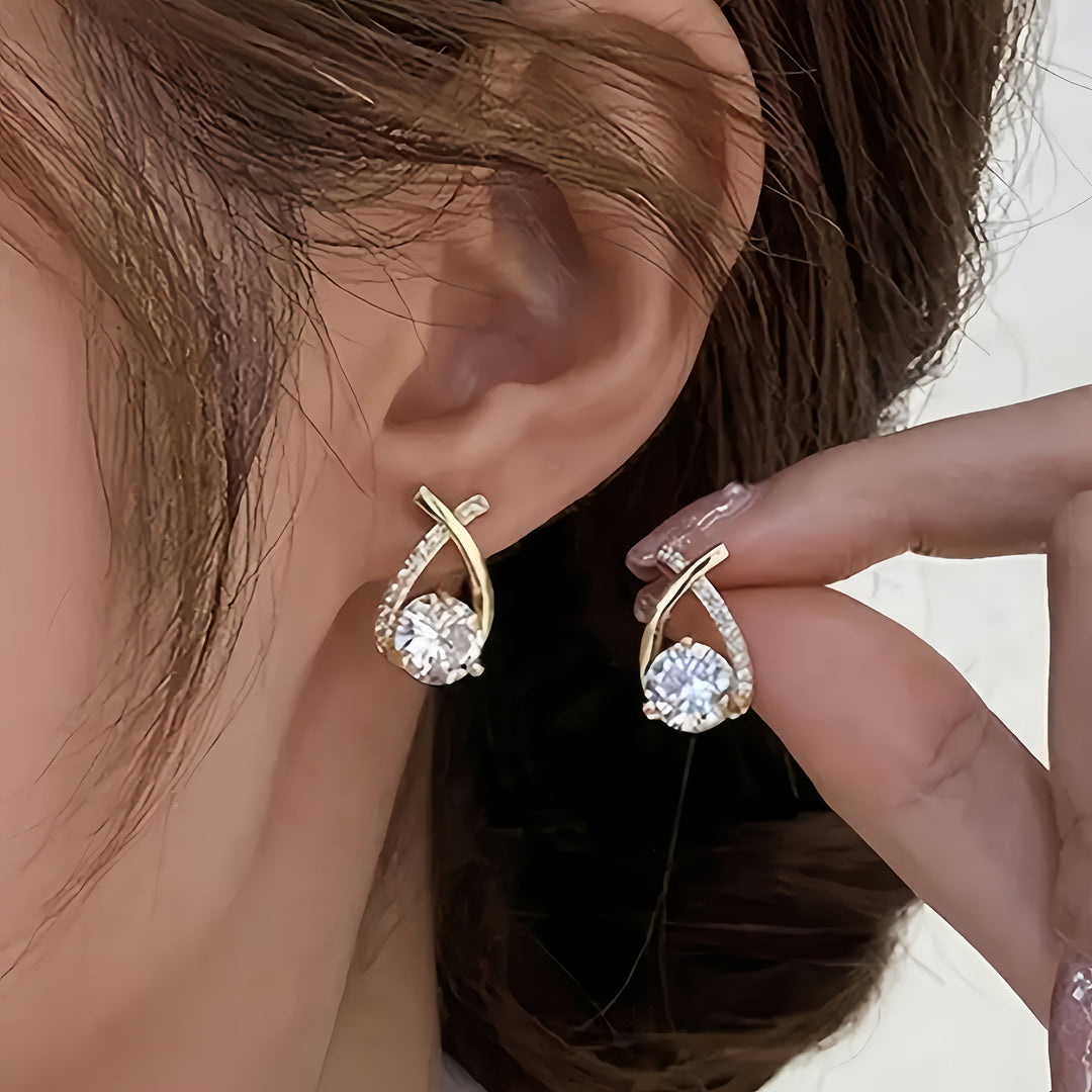 Gold cross and zirconia earrings