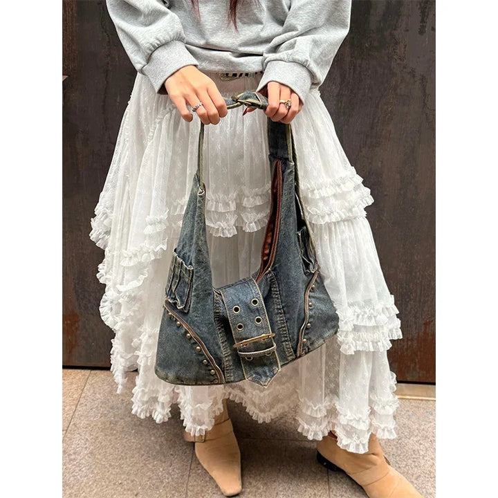 Studded Denim Hobo Bag in Washed Blue | Michael & Laura Toronto